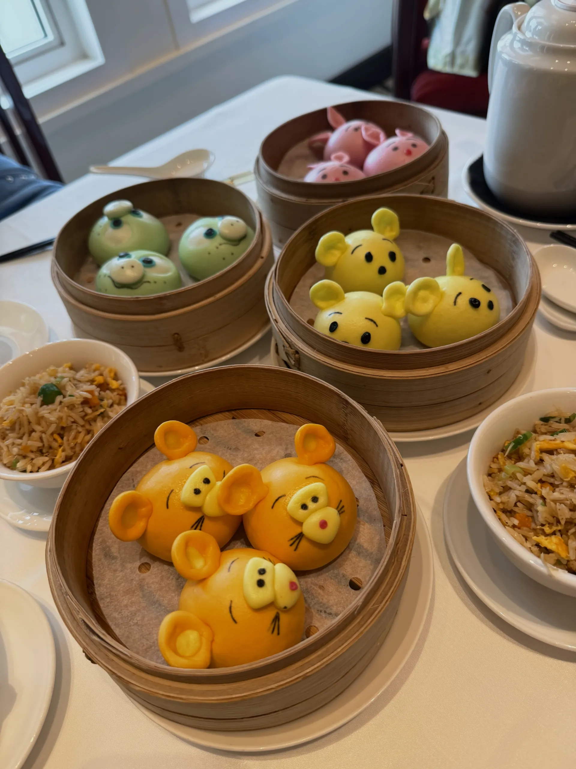 These are Disney-themed steamed vegetable and pork buns.